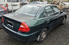 Lot-11-–-2001-Green-Mitsubishi-sedan-.3.jpg