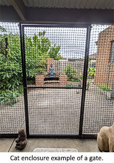 confine-your-pet-cat-enclosure-example-of-a-gate-with-netting.png