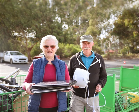 couple at e-waste collection event