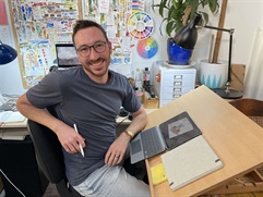 simon ccarrigan portrait at desk