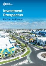 The cover of the Investment Prospectus: partner to prosper. Image shows an industrial business precinct.